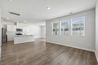 Spacious open floor plan with dedicated dining area.