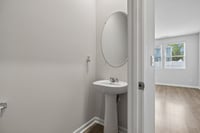 Downstairs guest half bathroom.